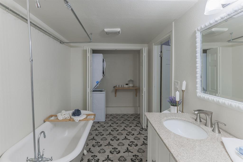 453 East Marshall Street Van Alstyne, TX 75495 - Photo 13 of 30 a bathroom with a sink toilet and shower