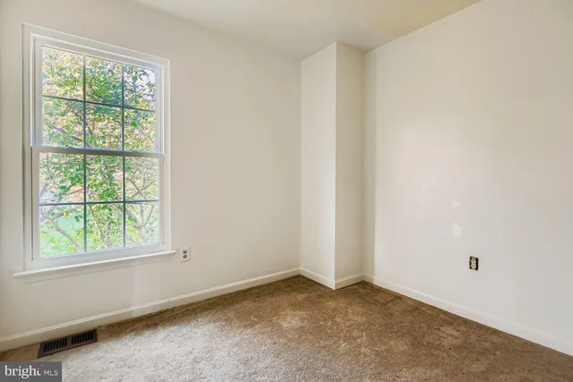 an empty room with a window