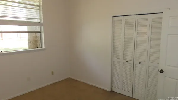 an empty room with a window