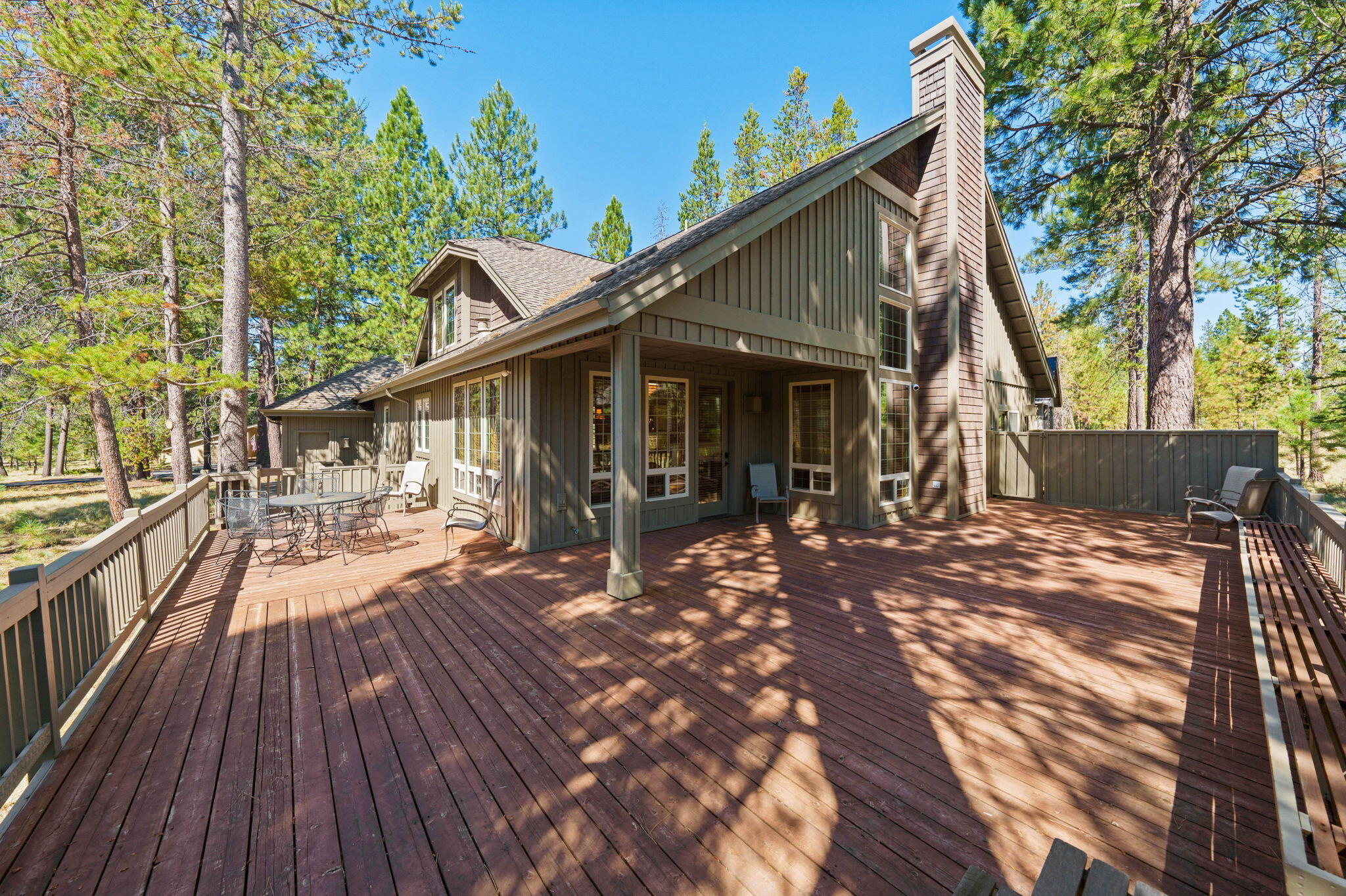 58026 Kinglet Road Sunriver, OR 97707 - Photo 30 of 39 a front view of a house with a yard