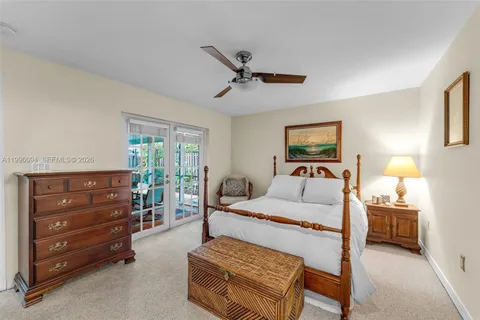 a bedroom with a bed and furniture