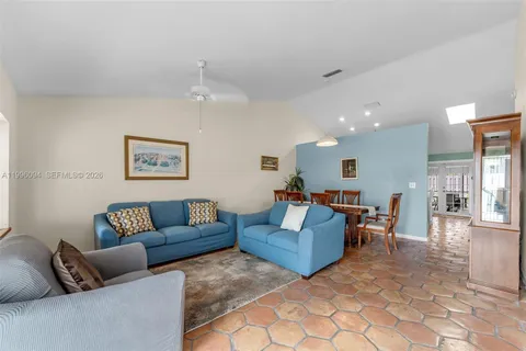 a living room with furniture and a couch