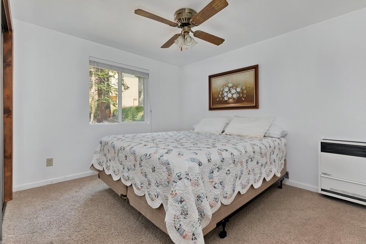 250 Davison Road Mammoth Lakes, CA 93546 - Photo 11 of 30 a bedroom with a bed and a window