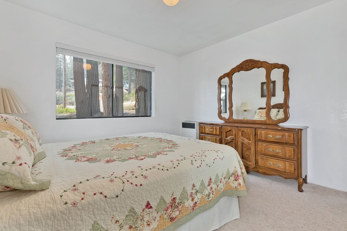 250 Davison Road Mammoth Lakes, CA 93546 - Photo 13 of 30 a bedroom with a bed and a dresser