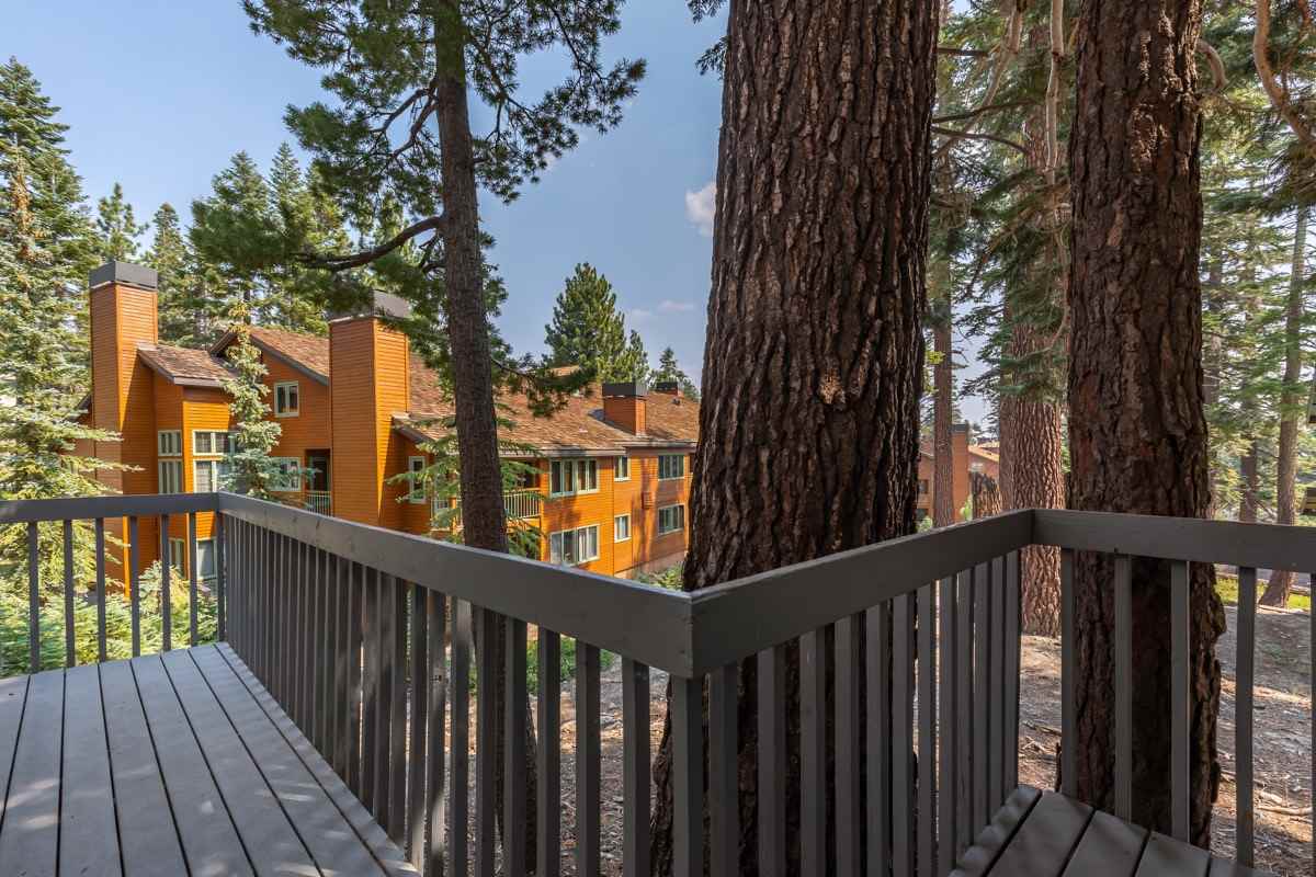 250 Davison Road Mammoth Lakes, CA 93546 - Photo 29 of 30 a view of a balcony with wooden floor and fence