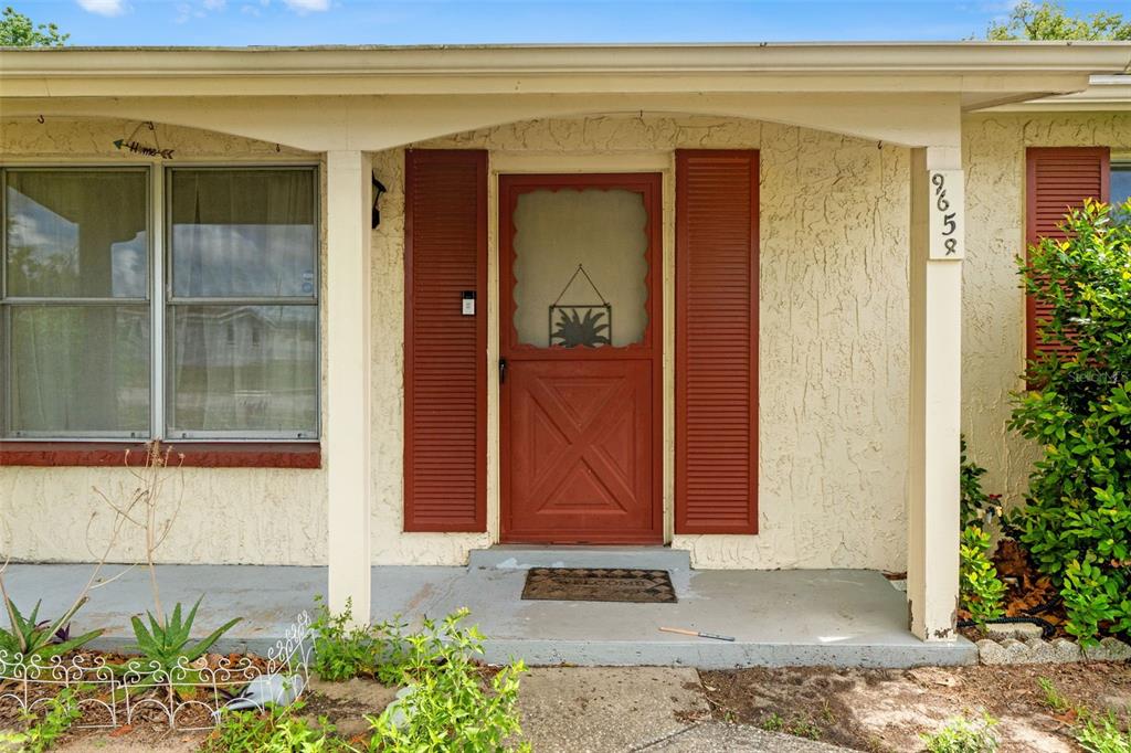 9658 Bayside Court Spring Hill, FL 34608 - Photo 5 of 34 a front view of a house