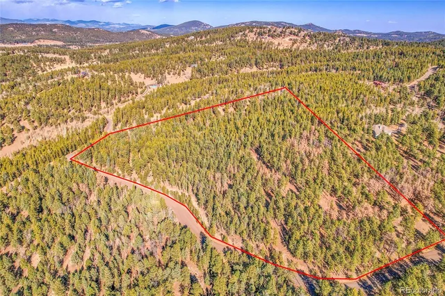 a view of a city with an ocean