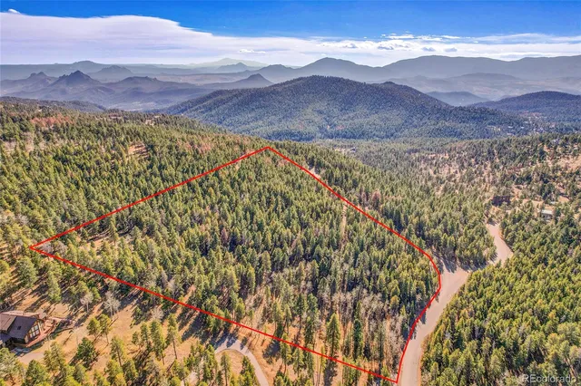 a view of mountain with an outdoor space