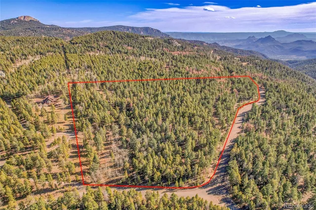 a view of a city with mountain