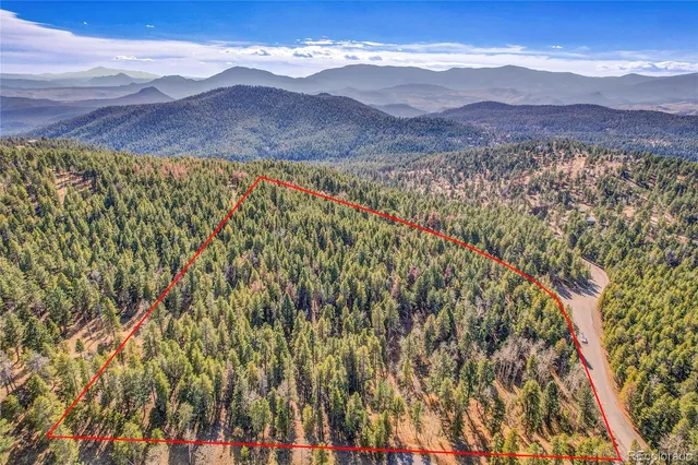 a view of mountain with lake