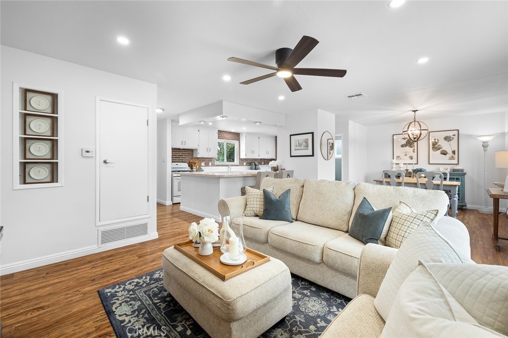 5472 Marion Avenue Cypress, CA 90630 - Photo 2 of 36 a living room with furniture and a view of kitchen