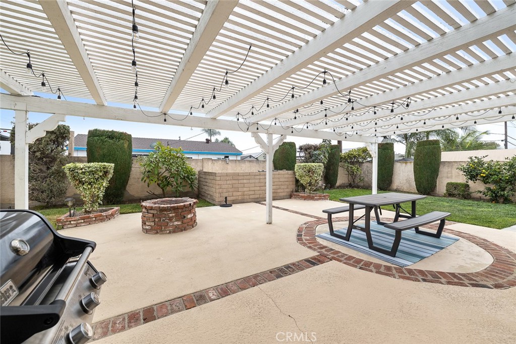5472 Marion Avenue Cypress, CA 90630 - Photo 25 of 36 a building outdoor space with patio furniture and potted plants