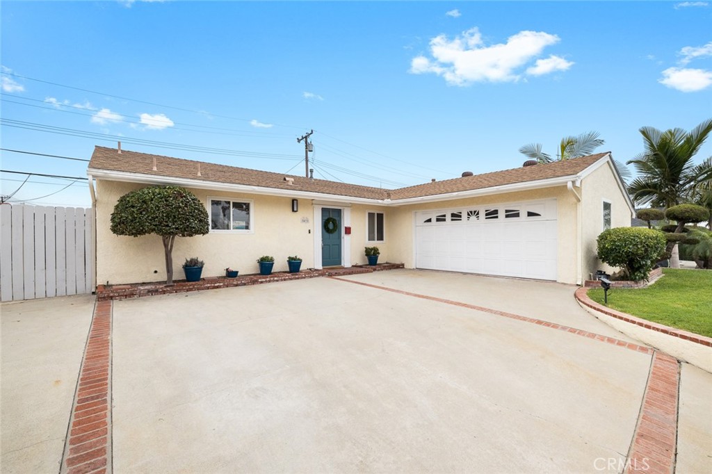 5472 Marion Avenue Cypress, CA 90630 - Photo 33 of 36 a view of a house with a garage