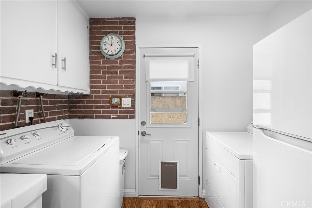 5472 Marion Avenue Cypress, CA 90630 - Photo 9 of 36 a utility room with dryer and washer