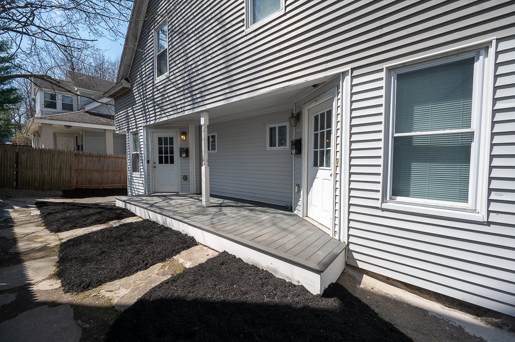 104 1/2 Rodney Street Worcester, MA 01605 - Photo 2 of 25 a view of a house with a bed