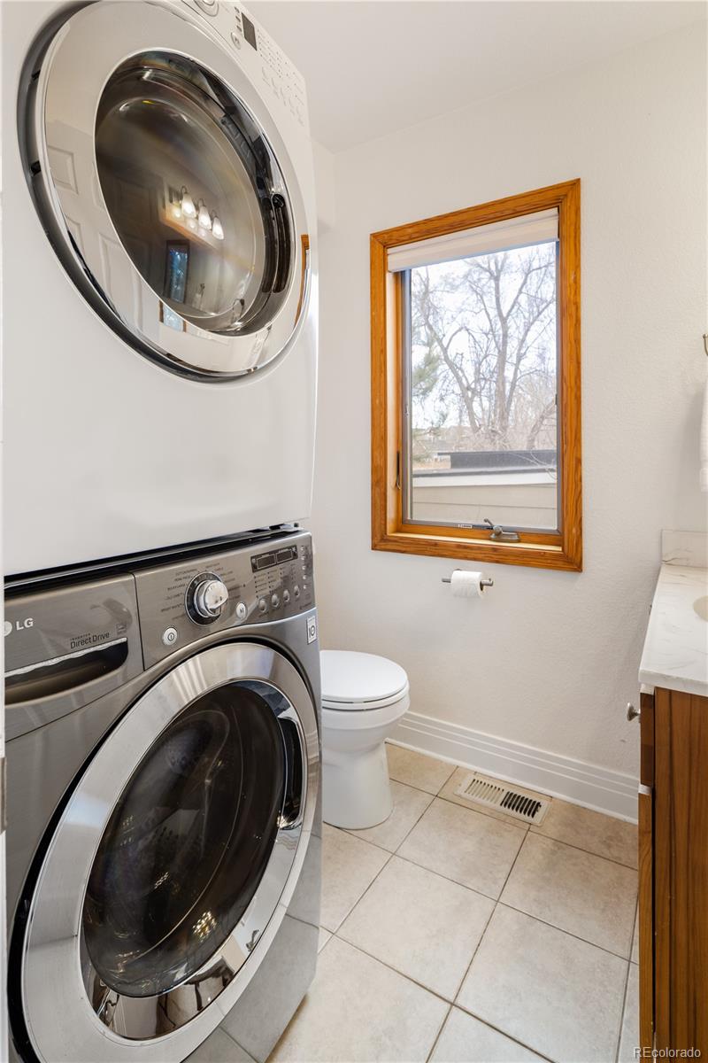 380 County Road Louisville, CO 80027 - Photo 12 of 42 a bathroom with a toilet and a sink