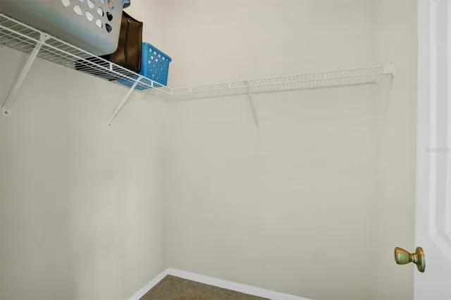 a view of a room with racks on the wall