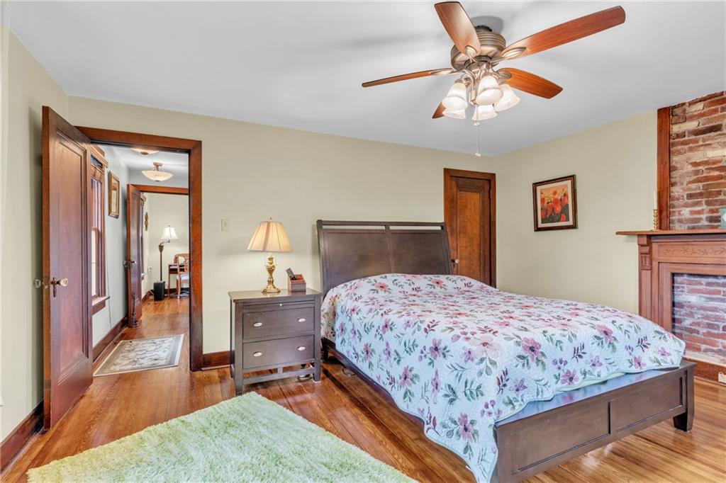 461 Manor Road Wexford, PA 15090 - Photo 15 of 43 a bedroom with a bed and a chandelier