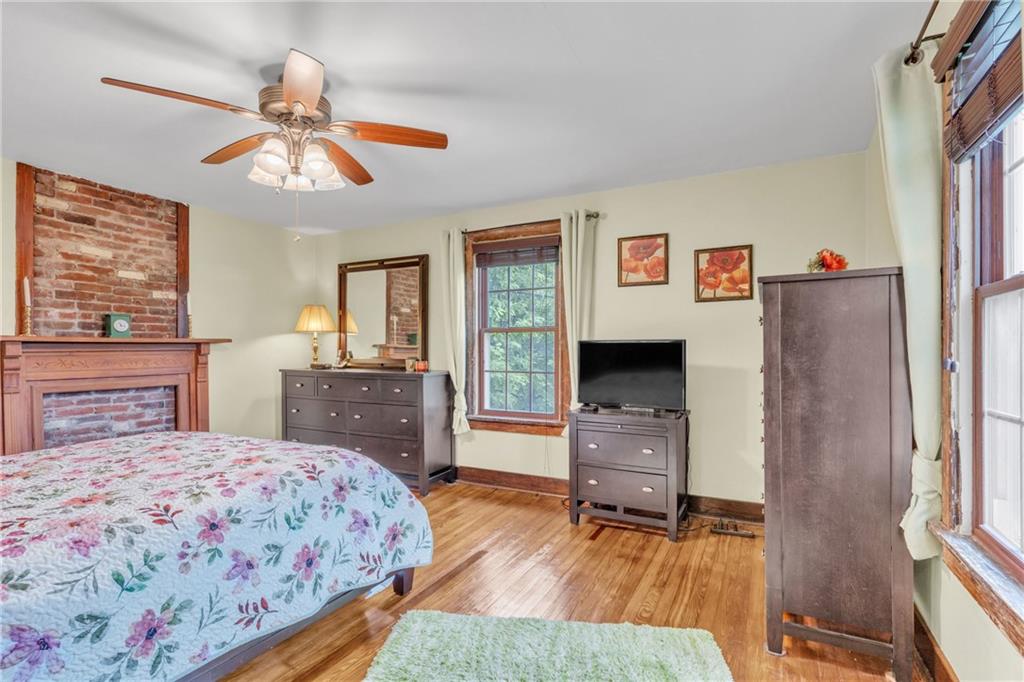 461 Manor Road Wexford, PA 15090 - Photo 16 of 43 a bedroom with a bed and a flat screen tv