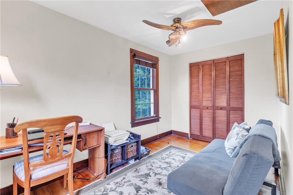 461 Manor Road Wexford, PA 15090 - Photo 20 of 43 a bedroom with a bed and a chandelier