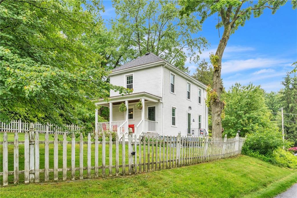 461 Manor Road Wexford, PA 15090 - Photo 2 of 43 a view of a white house with a big yard and plants