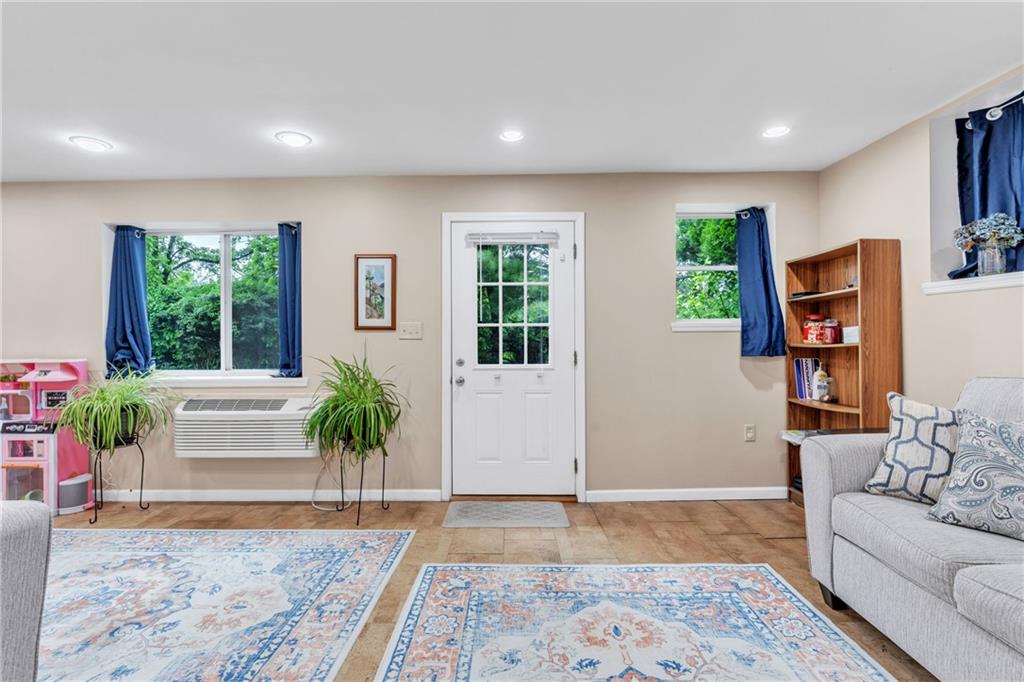 461 Manor Road Wexford, PA 15090 - Photo 24 of 43 a living room with furniture and a potted plant