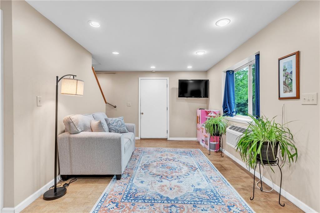 461 Manor Road Wexford, PA 15090 - Photo 26 of 43 a living room with furniture and a flat screen tv