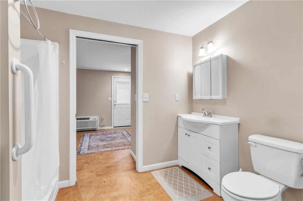 461 Manor Road Wexford, PA 15090 - Photo 31 of 43 a bathroom with a toilet sink and mirror