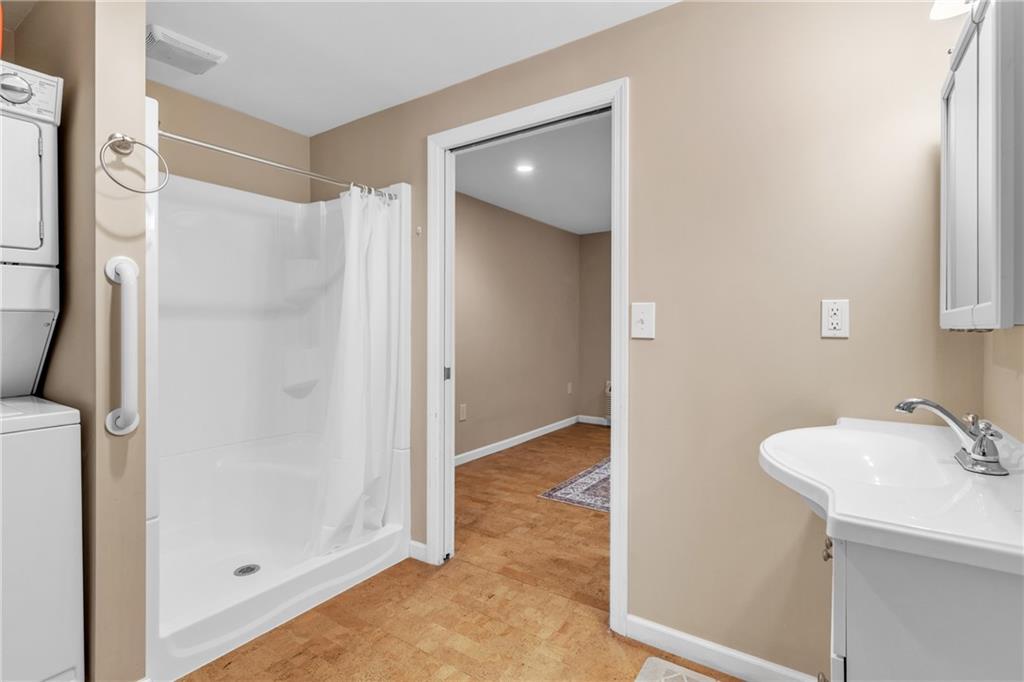 461 Manor Road Wexford, PA 15090 - Photo 32 of 43 a bathroom with a sink and a mirror