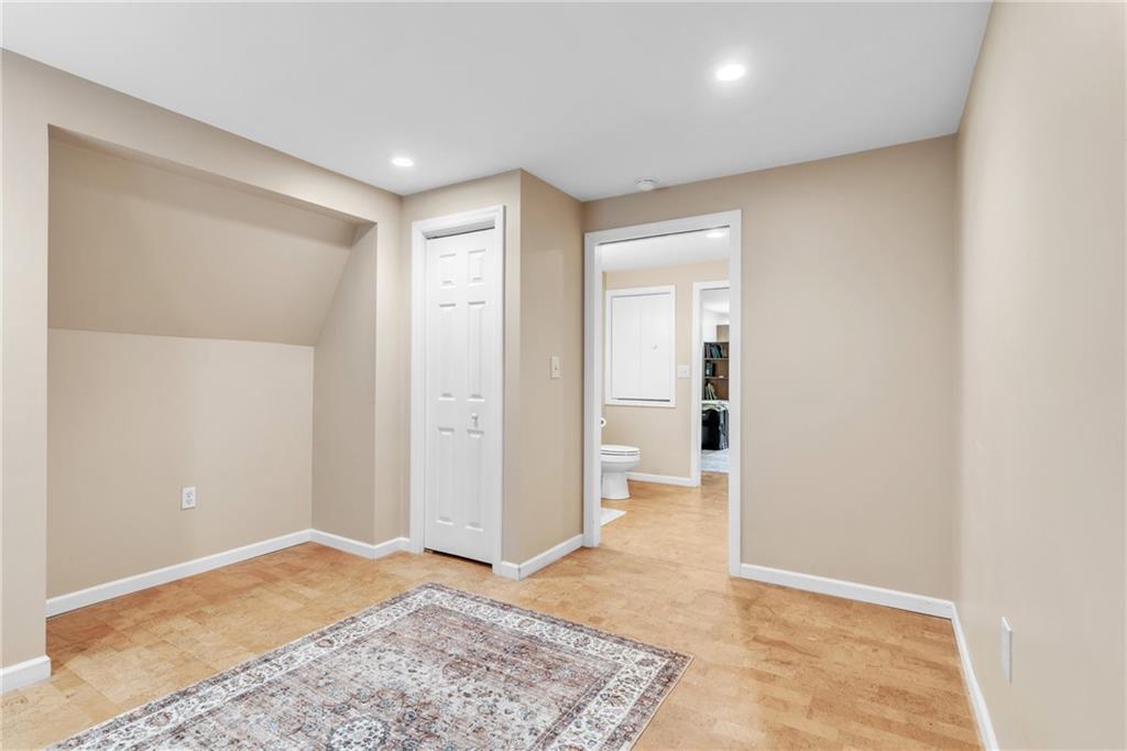 461 Manor Road Wexford, PA 15090 - Photo 34 of 43 a view of a big room with wooden floor and a bathroom