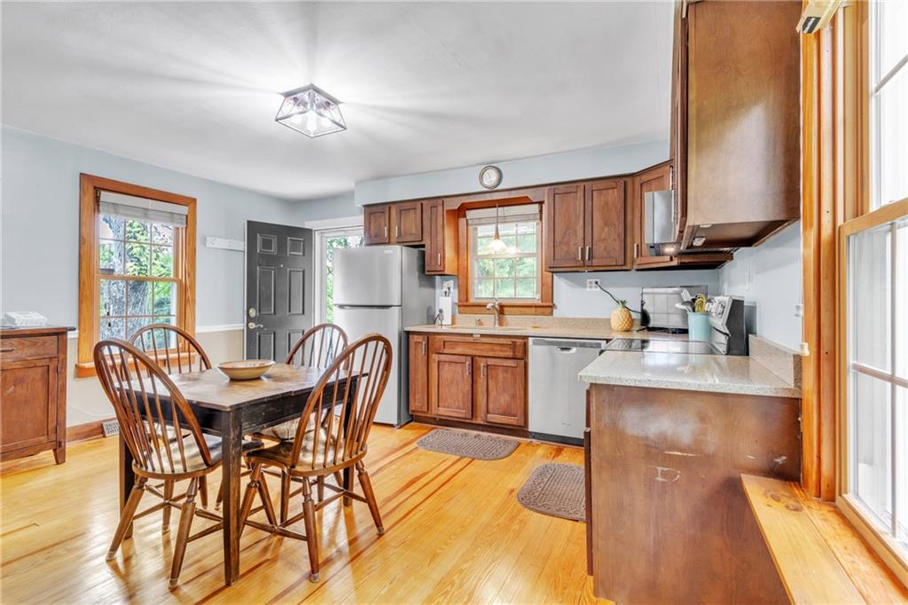 461 Manor Road Wexford, PA 15090 - Photo 8 of 43 a dining room with furniture and a large window