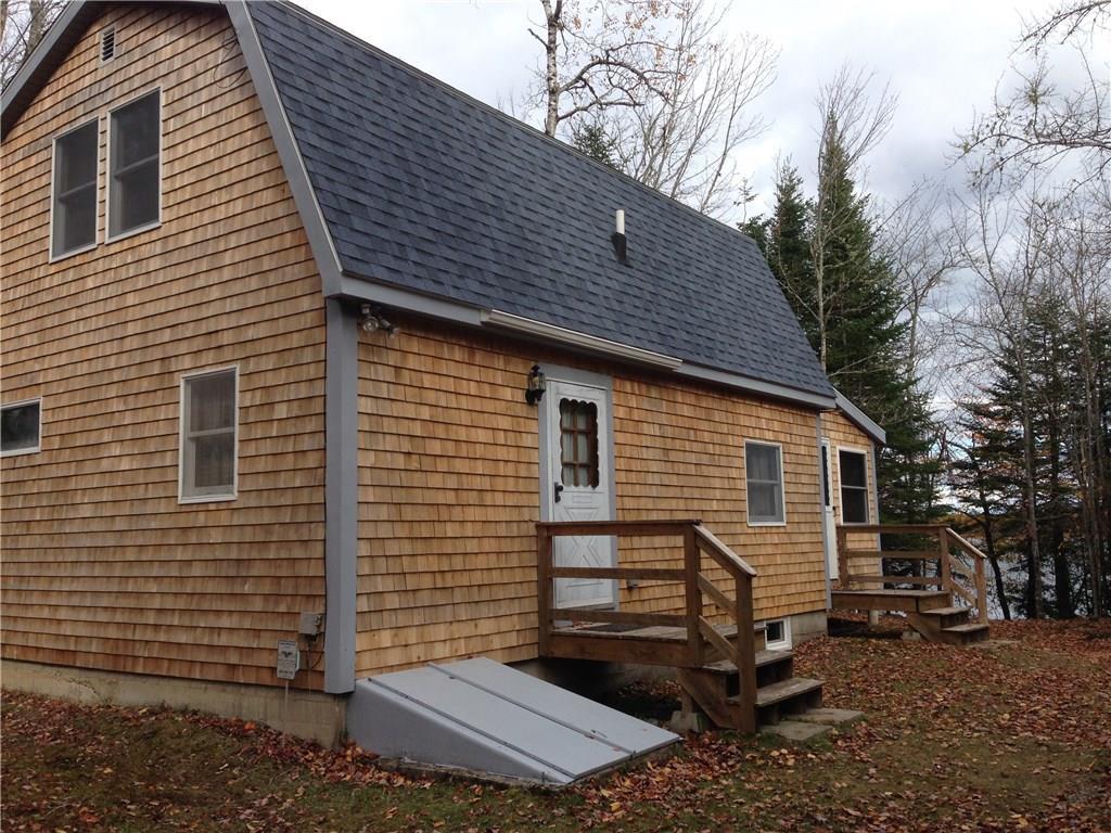 25 Roy's Way Perry, ME 04667 - Photo 4 of 35 View of house from driveway facing...