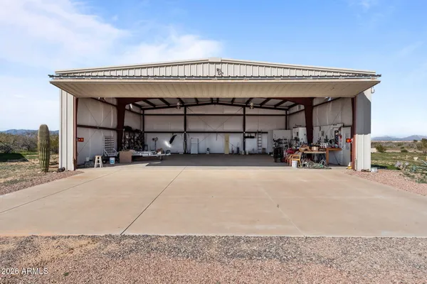 a view of parking garage with cars