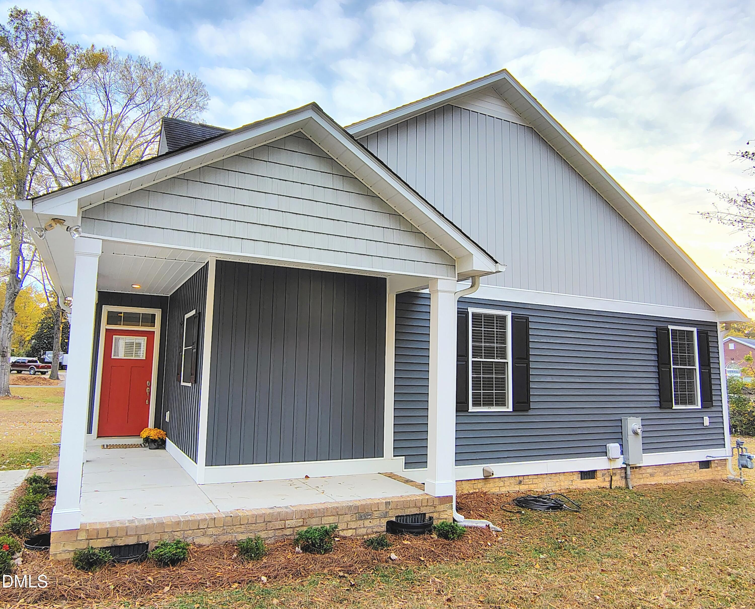 307 Chaplin Street Wendell, NC 27591 - Photo 2 of 24 a front view of a house with garden