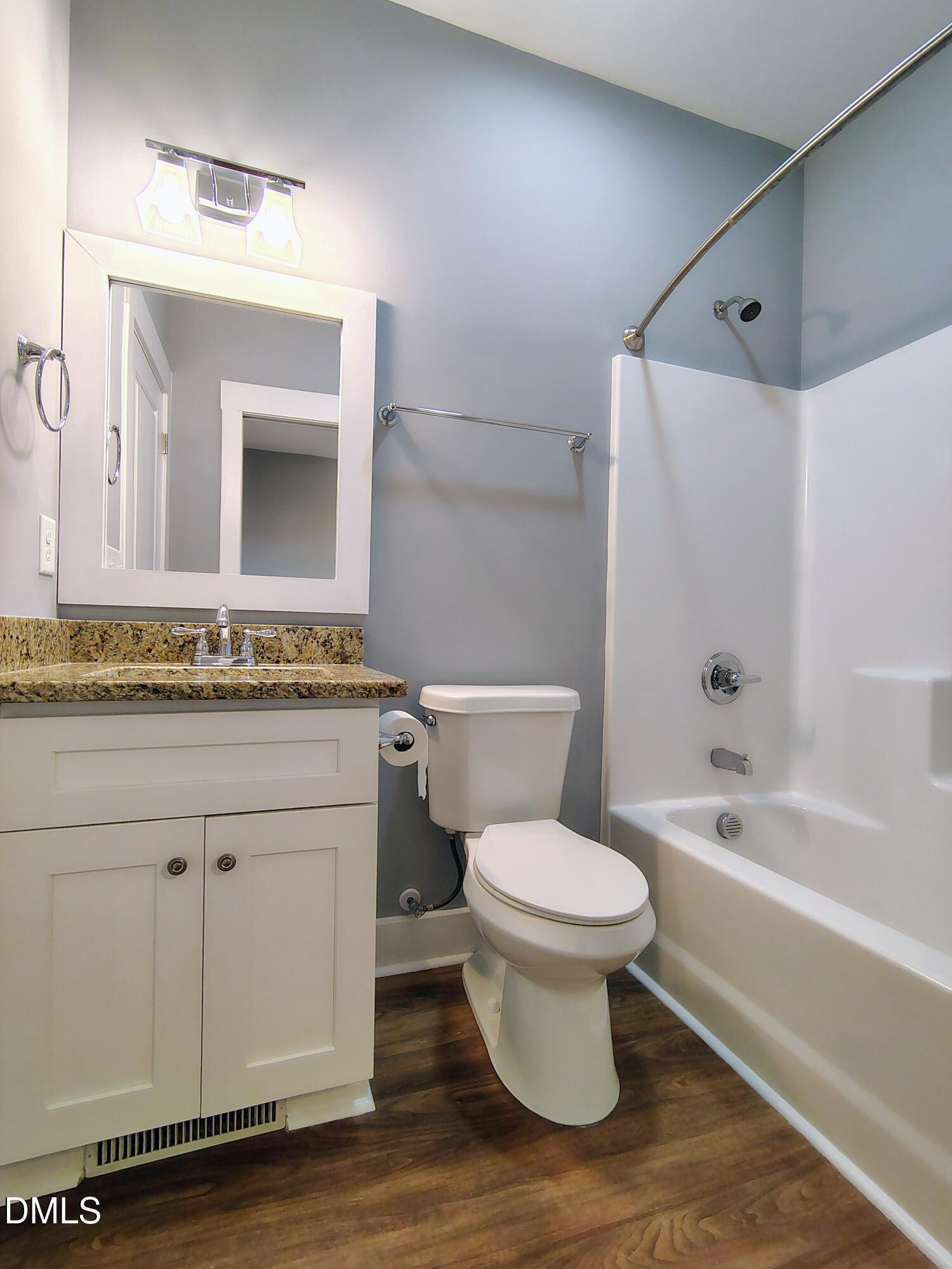 307 Chaplin Street Wendell, NC 27591 - Photo 21 of 24 a bathroom with a sink toilet and shower