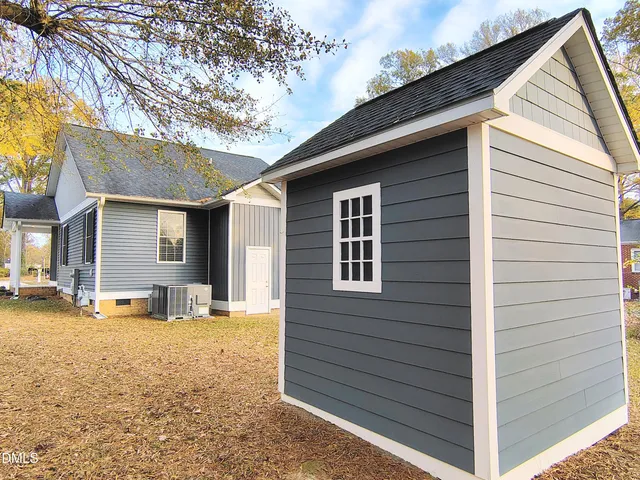 a view of a house with a patio
