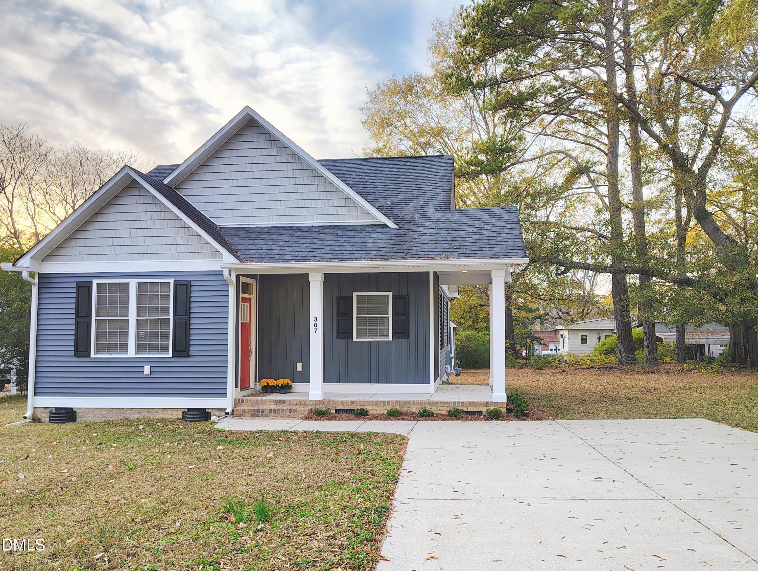307 Chaplin Street Wendell, NC 27591 - Photo 5 of 24 a front view of a house with yard