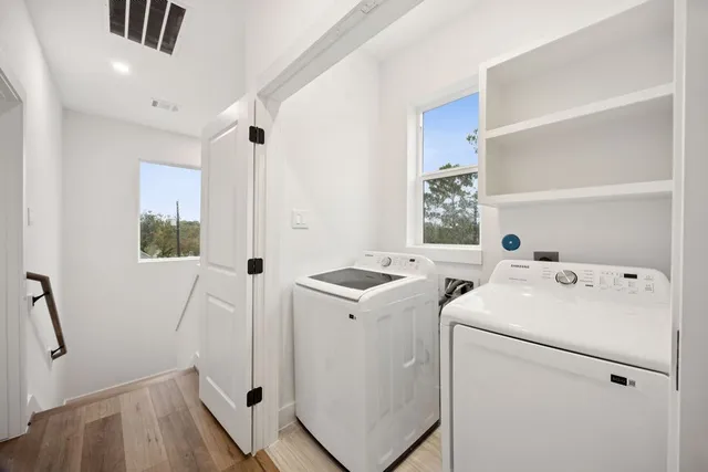 a utility room with dryer and washer
