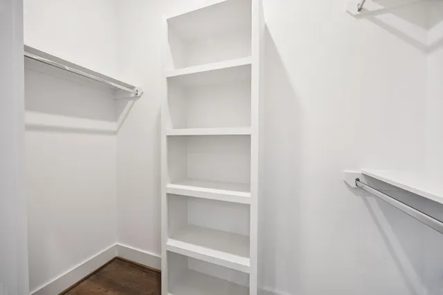 a view of an empty walk in closet