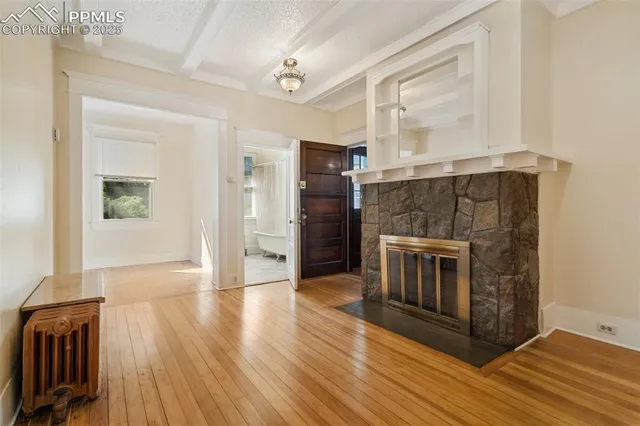 a white stove top oven sitting inside of a kitchen
