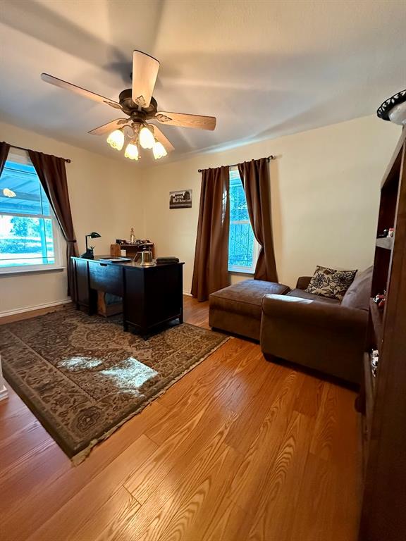 3420 Springfield Road Springtown, TX 76082 - Photo 30 of 38 a living room with furniture and a large window