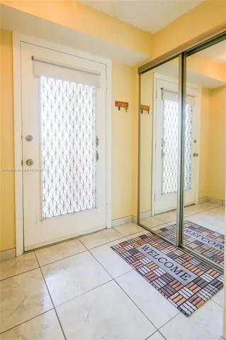 a view of an entryway with a glass door