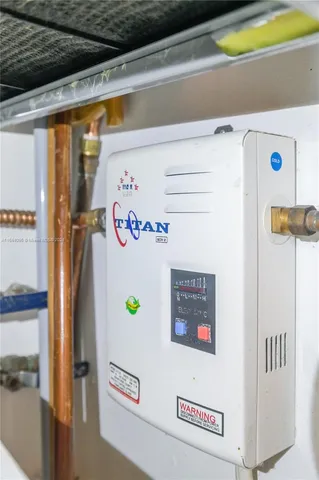 a bathroom with a sink toilet and mirror