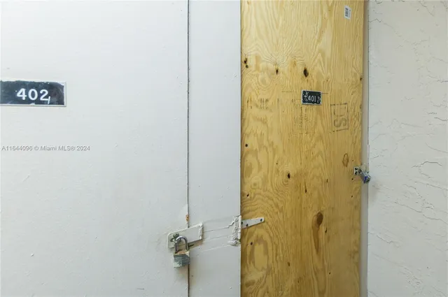 a view of a backyard with sitting area