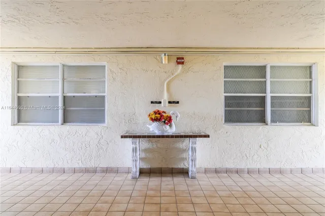 a front view of a building with street view