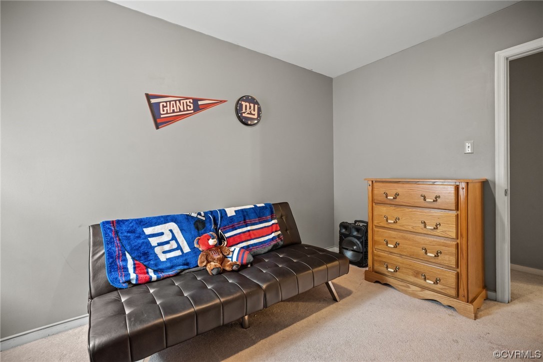 5331 Gatebridge Road North Chesterfield, VA 23234 - Photo 25 of 29 a living room with furniture and a baby crib