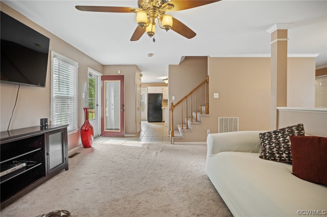 5331 Gatebridge Road North Chesterfield, VA 23234 - Photo 9 of 29 a living room with furniture a flat screen tv and a chandelier