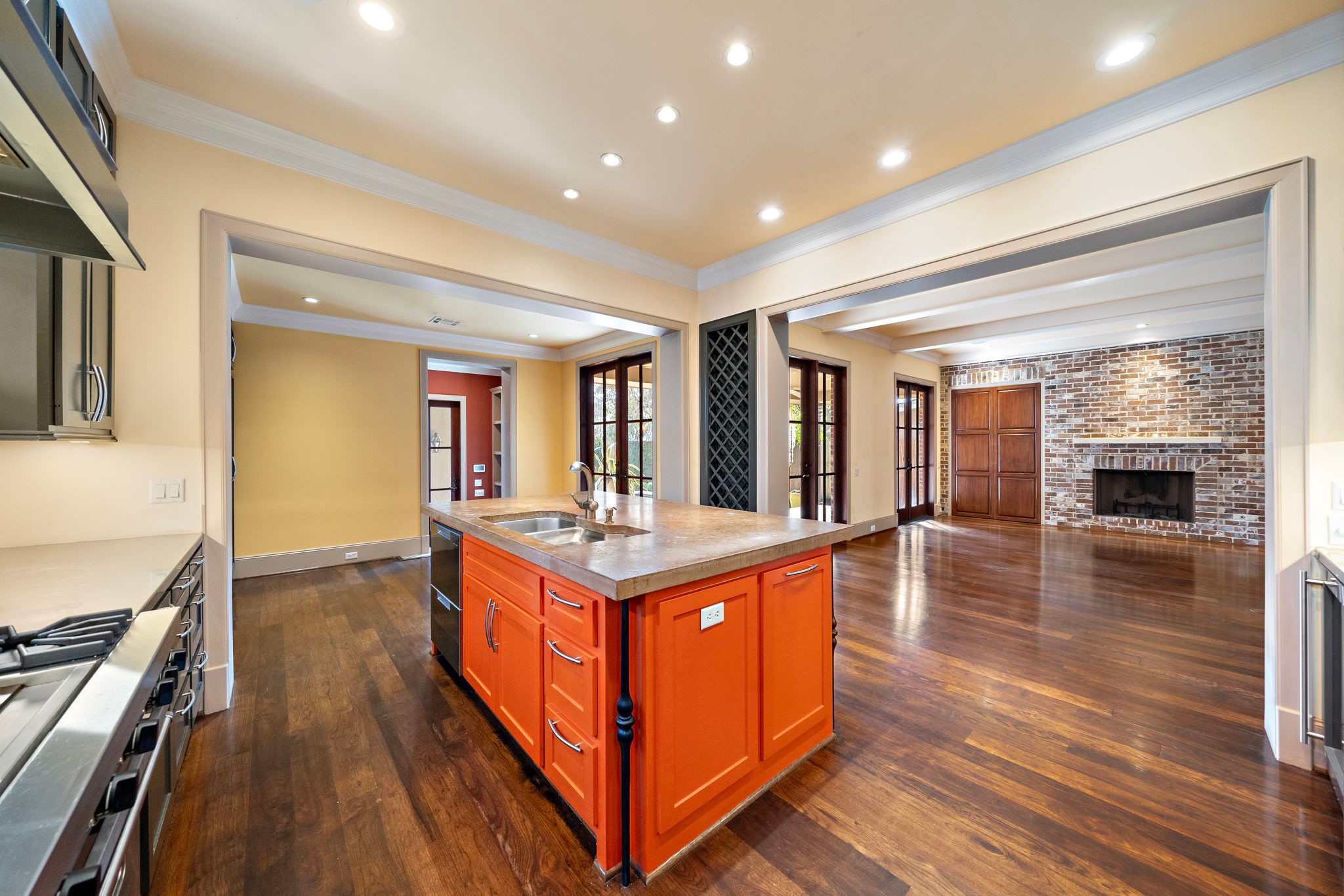 3603 Audubon Place Houston, TX 77006 - Photo 13 of 29 a kitchen with stainless steel appliances granite countertop a stove and a wooden floors