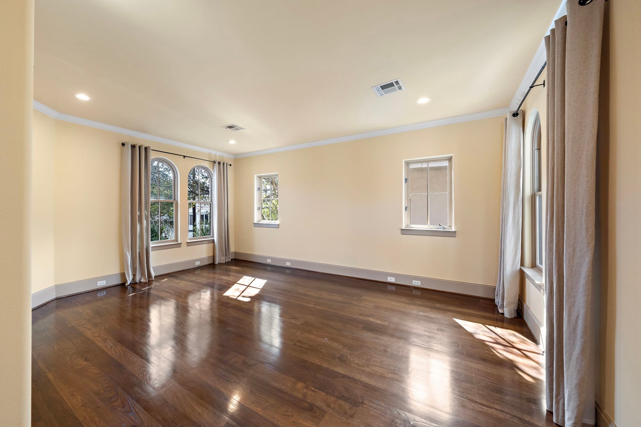 3603 Audubon Place Houston, TX 77006 - Photo 23 of 29 a view of an empty room with wooden floor and a window