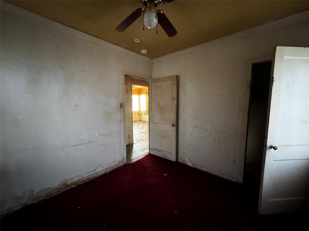 540 Dunbar Avenue Waco, TX 76704 - Photo 19 of 24 wooden floor in an empty room with a window